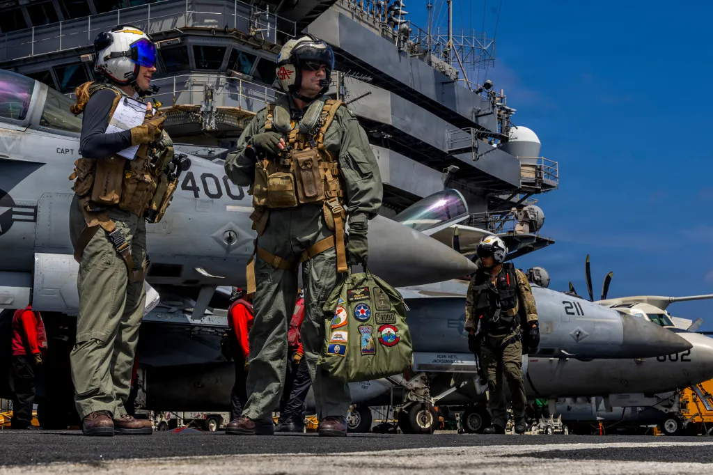 Captain Daniel Keeler on the deck of the USS Abraham Lincoln aircraft carrier.