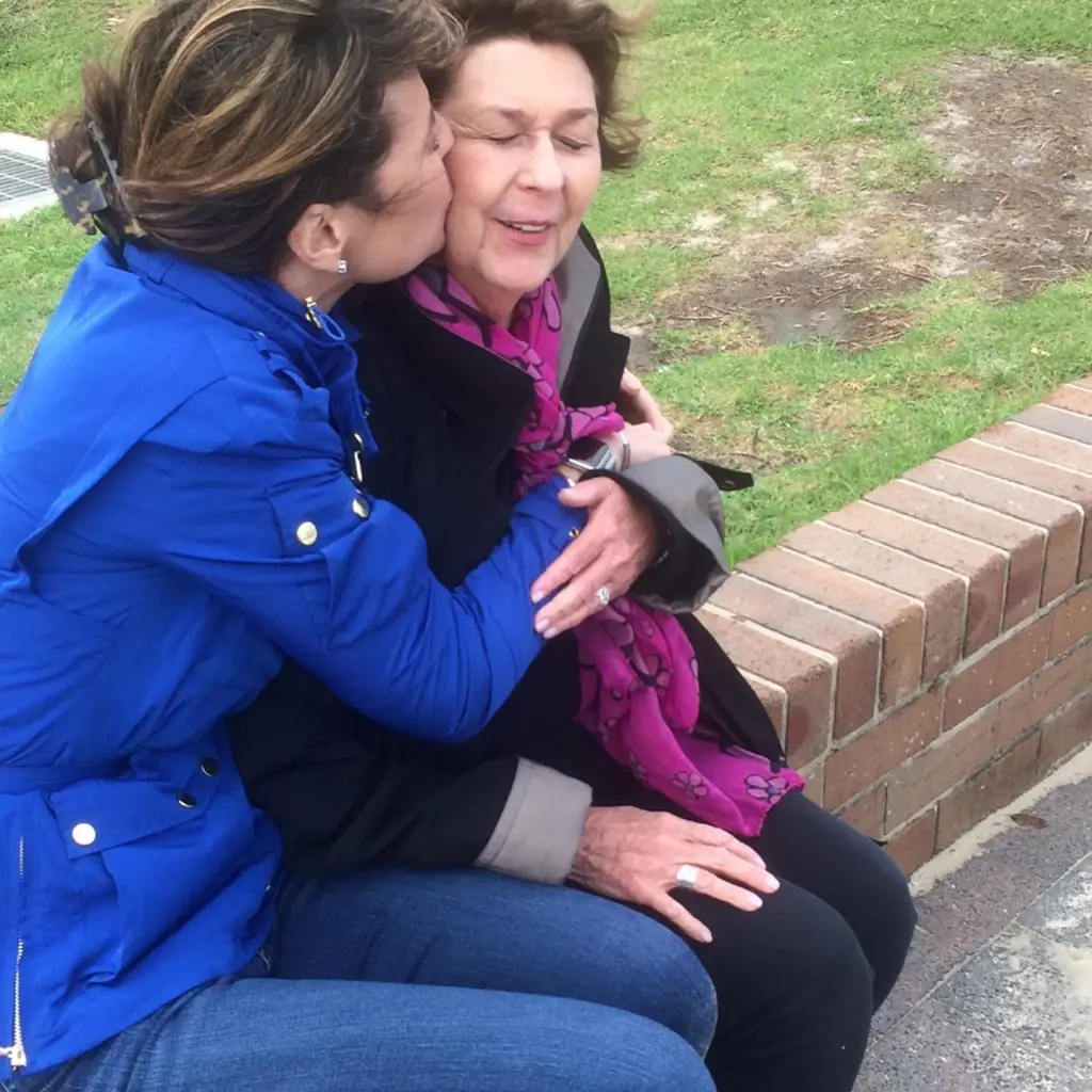 Savannah Guthrie kissing her mother, Nancy Guthrie.