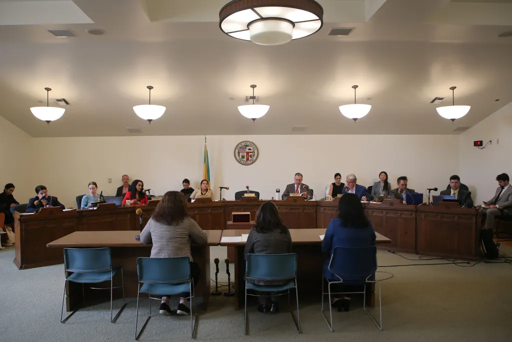 People attending a homeless and housing meeting at Los Angeles City Hall.