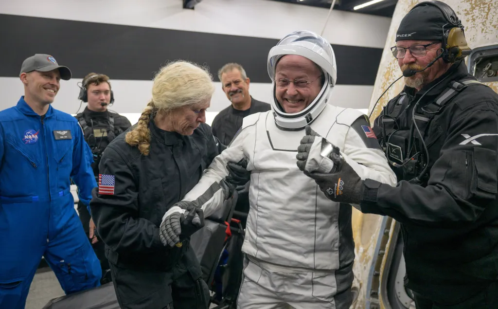 NASA astronaut Mike Fincke is helped out of the SpaceX Crew-11 capsule after returning to Earth on Jan. 15, 2026.