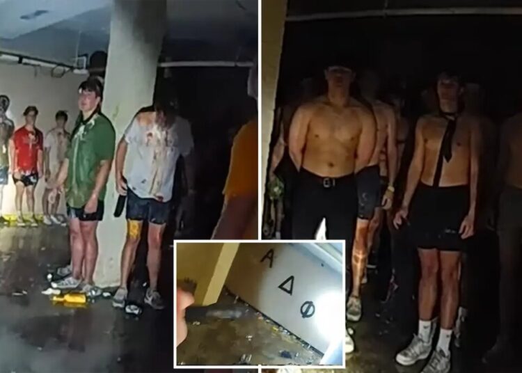 Disturbing viral bodycam footage captures dozens of shirtless, blindfolded University of Iowa pledges covered in food in frat basement