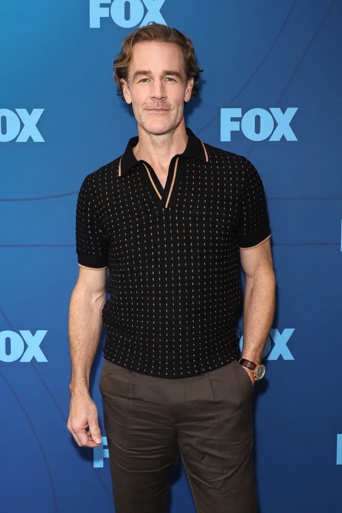 James Van Der Beek posing in a black and brown collared shirt and brown pants against a blue background with the FOX logo.