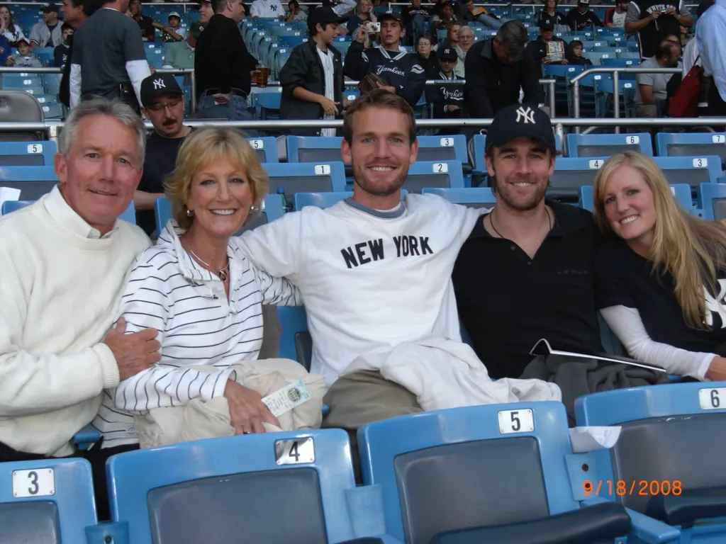 James Van Der Beek and his family at a Yankees game.