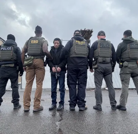 ICE officers arrest Chinese national Ling Yan during removal operations in West Virginia. 
