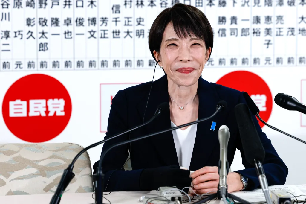 Japan's Prime Minister and President of the Liberal Democratic Party (LDP) Sanae Takaichi reacts as she speaks with media on the House of Representatives election day at the LDP headquarters in Tokyo on February 8, 2026. 