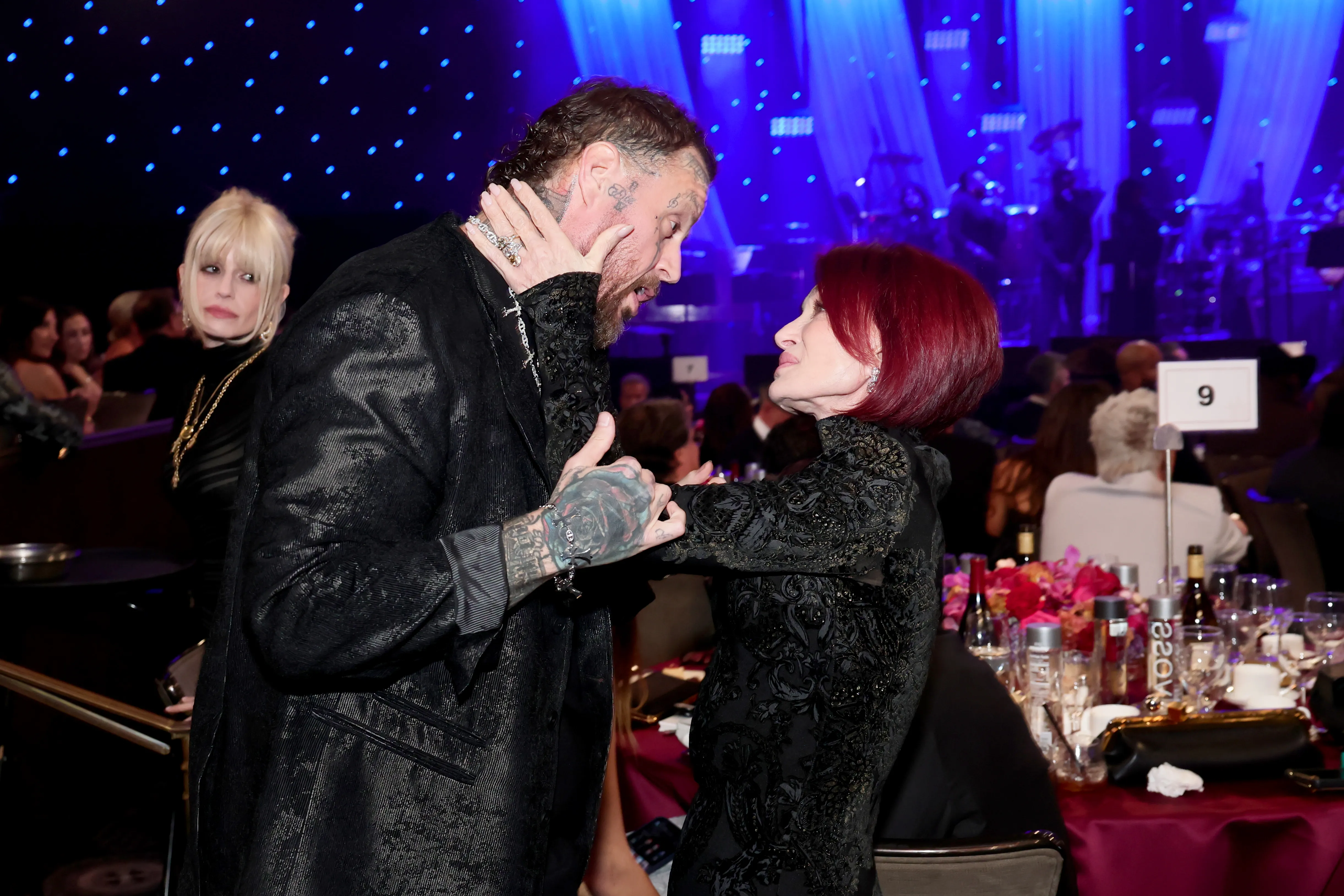 Jelly Roll and Sharon Osbourne chat at the Pre-GRAMMY Gala.