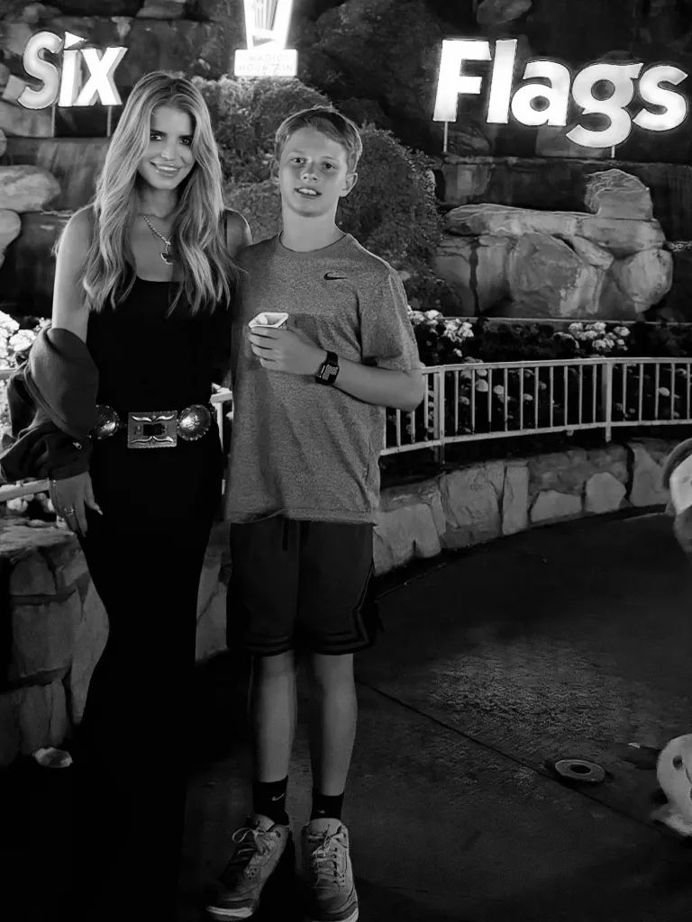 Jessica Simpson and her son Ace standing in front of the 