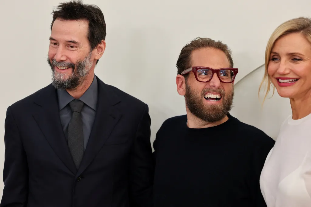 Keanu Reeves, Jonah Hill, and Cameron Diaz smiling at the Apple TV Press Day.