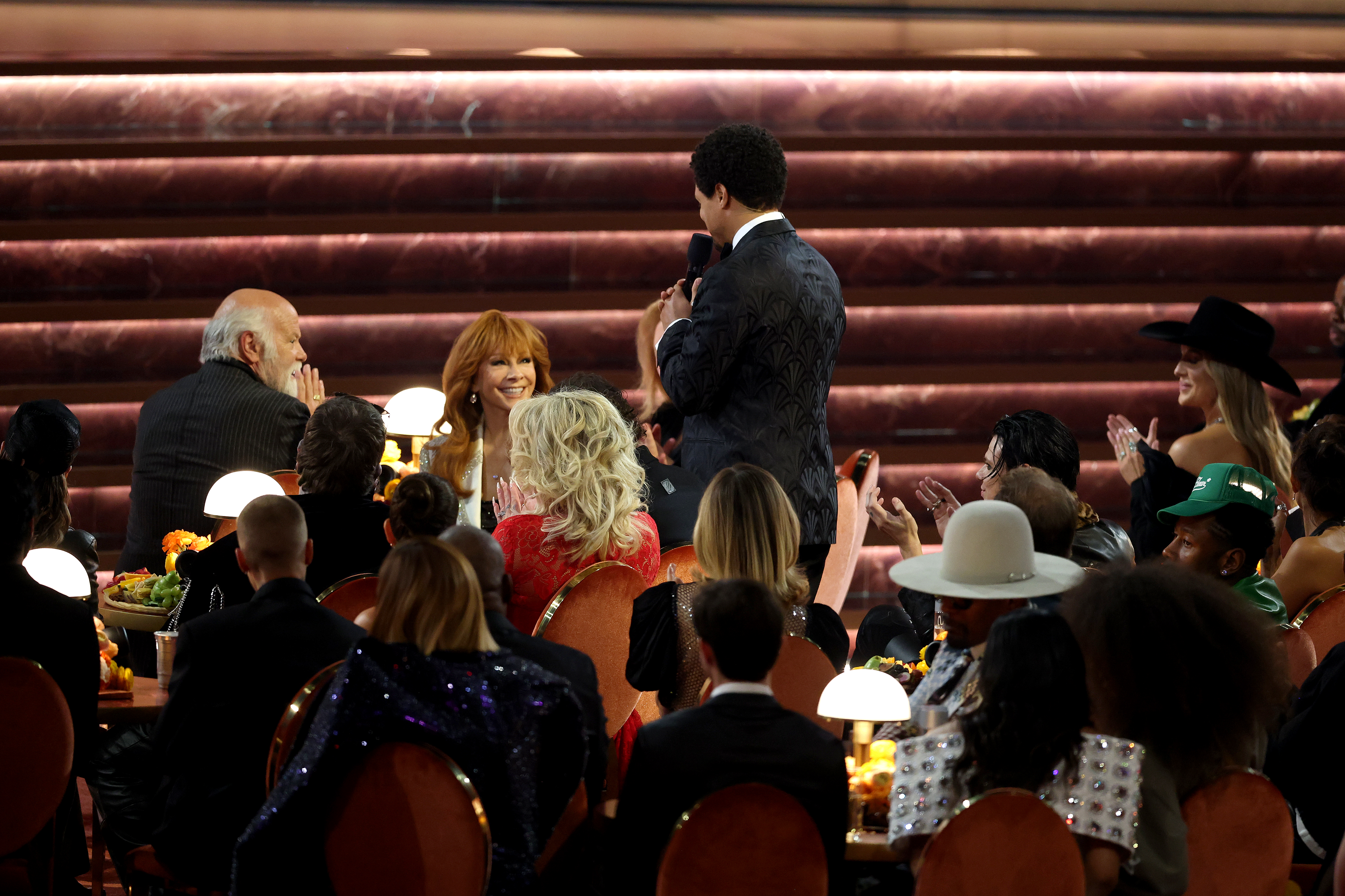 Trevor Noah at the Grammys talking to Reba