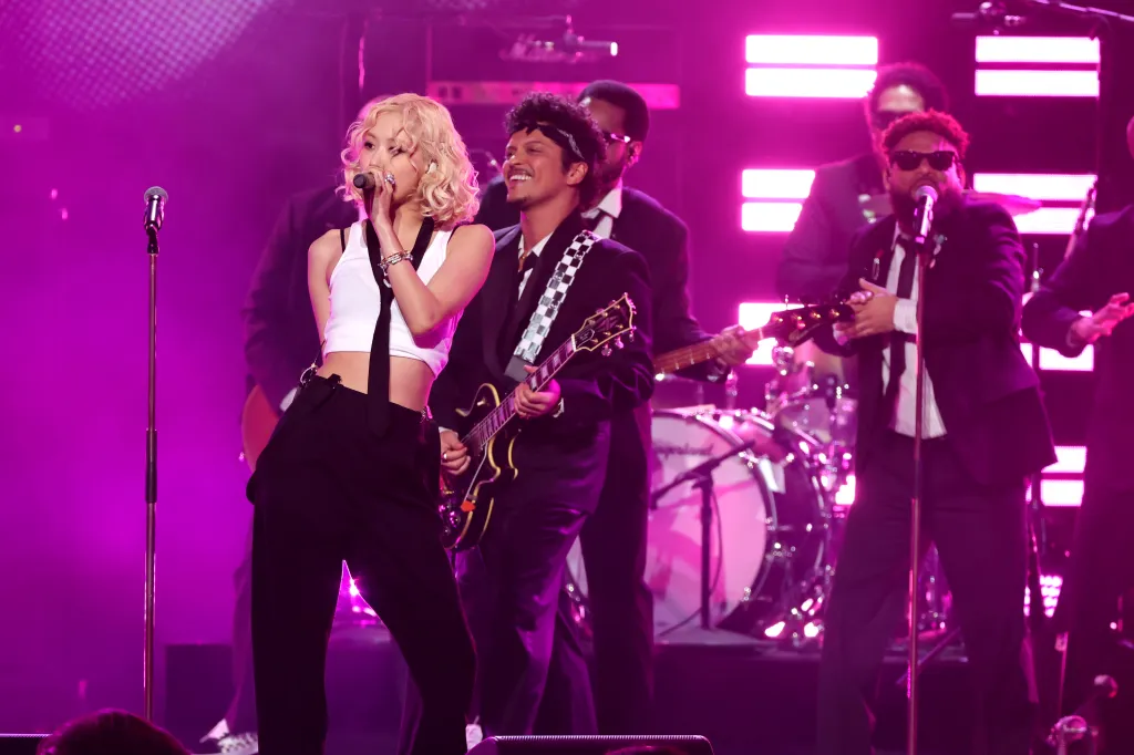 Rosé and Bruno Mars perform onstage during the 68th Grammy Awards.