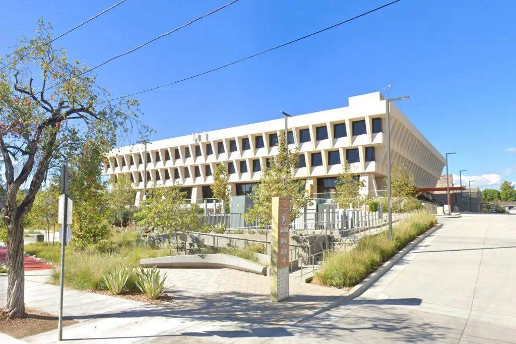 . The new ordinance expands eligibility beyond pre-1975 downtown structures to include office buildings at least 15 years old across the city, allowing many projects to win staff approval without lengthy political and environmental reviews.