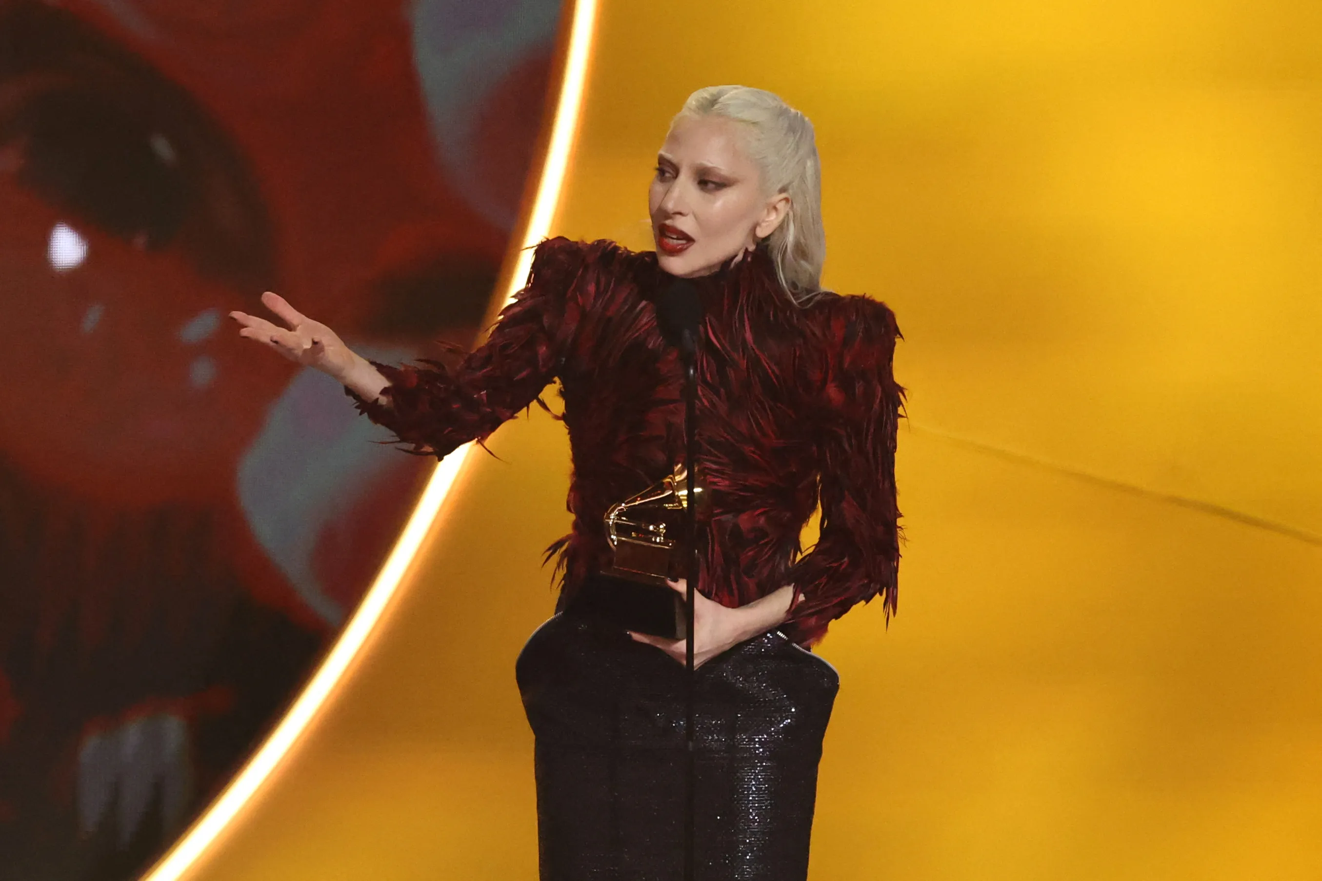 Lady Gaga accepting the Best Pop Vocal Album award for