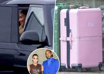 Kim Kardashian and Lewis Hamilton pictured arriving at swanky UK hotel for romantic weekend getaway