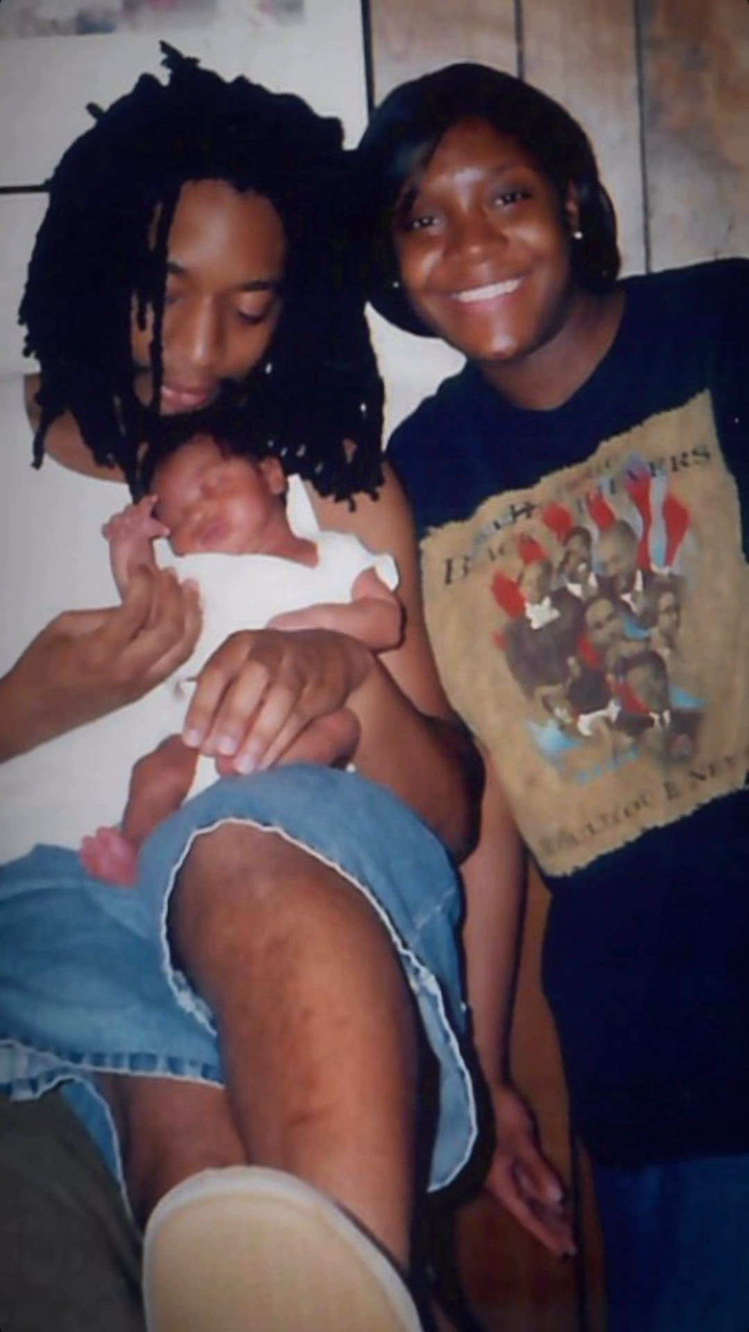 Lil Jon (left) holding his newborn son Nathan, with his wife Nicole Smith (right) beside him.