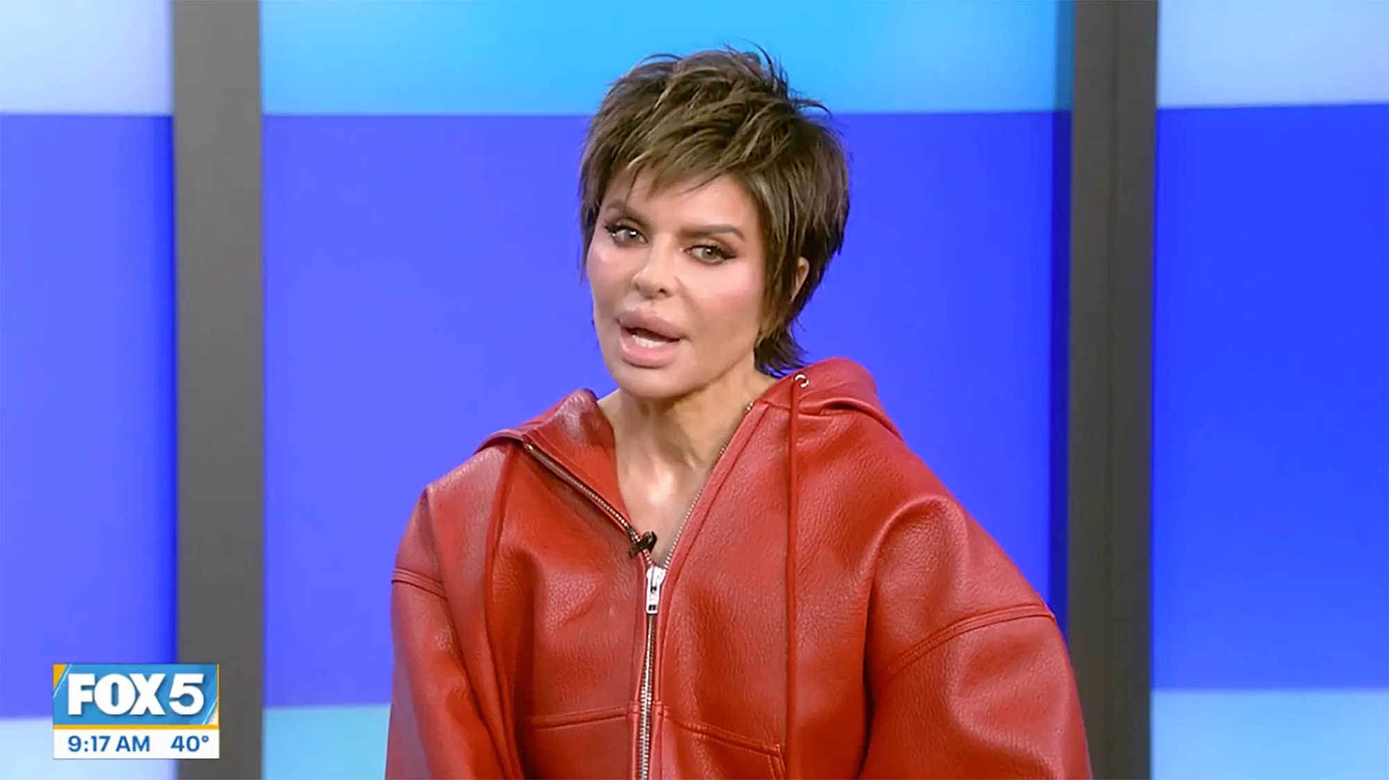 Lisa Rinna on Fox wearing a red jacket.