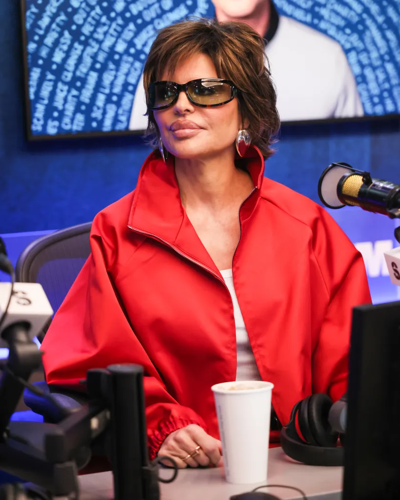 Lisa Rinna wearing sunglasses, a red jacket, and large silver earrings at SiriusXM Studios.