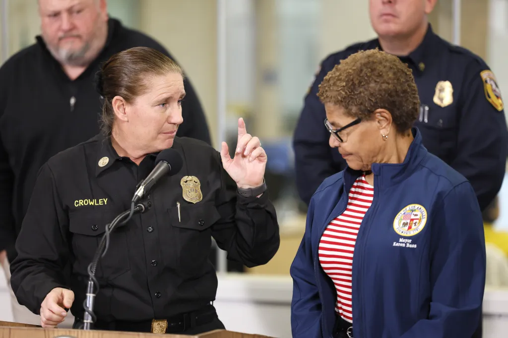 Los Angeles Fire Chief Kristin Crowley speaks at a press conference next to Mayor Karen Bass.
