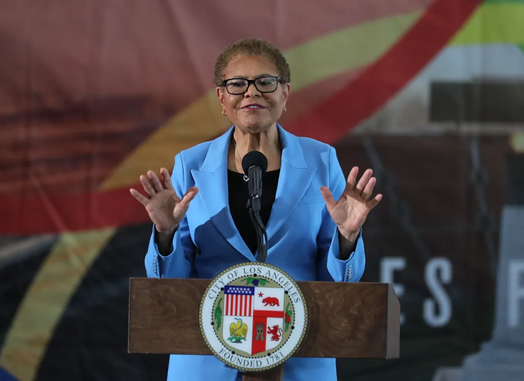 Los Angeles Mayor Karen Bass speaking at a podium during her State of the City address.