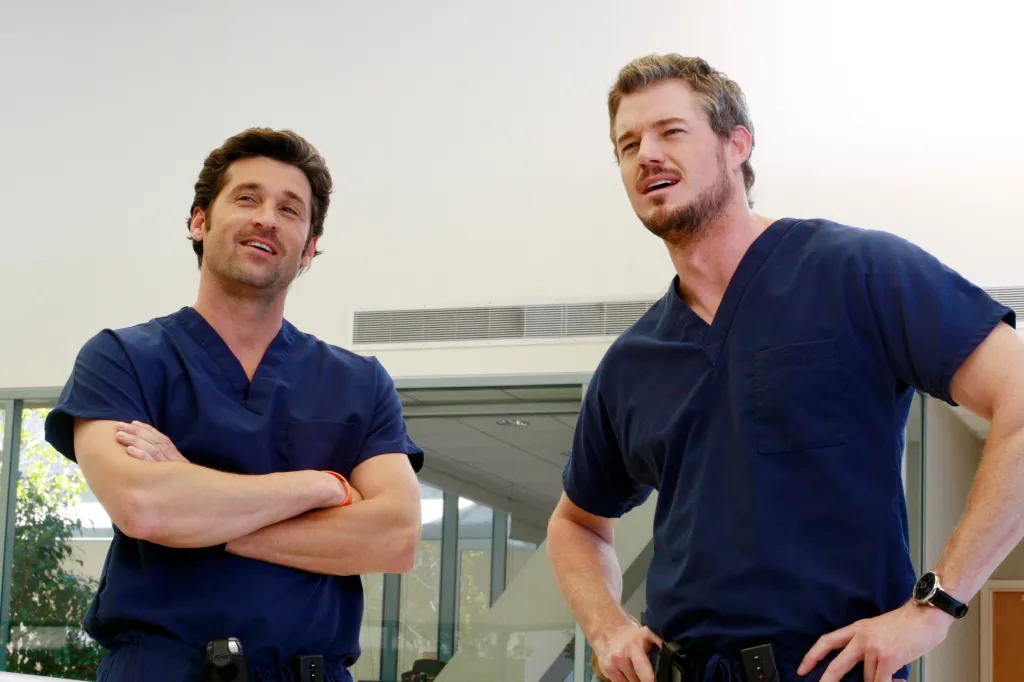 Eric Dane and Patrick Dempsey in character as doctors.