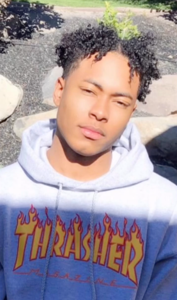 Robert Jr., son of Mary Cosby, wearing a Thrasher hoodie.