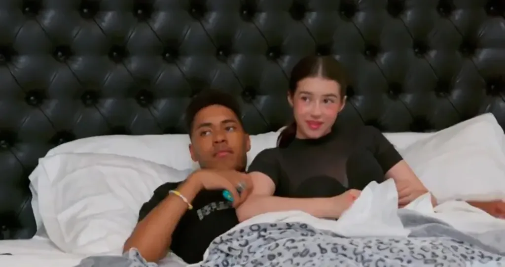 Mary Cosby's son Robert Jr. and his wife Alexiana Smokoff lying in bed.