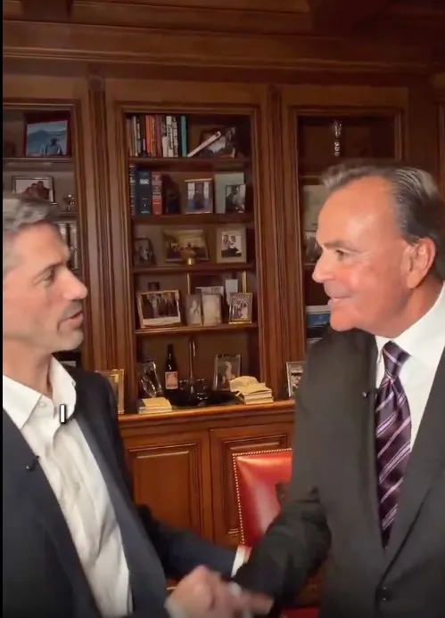 Rick Caruso and Matt Mahan shaking hands.