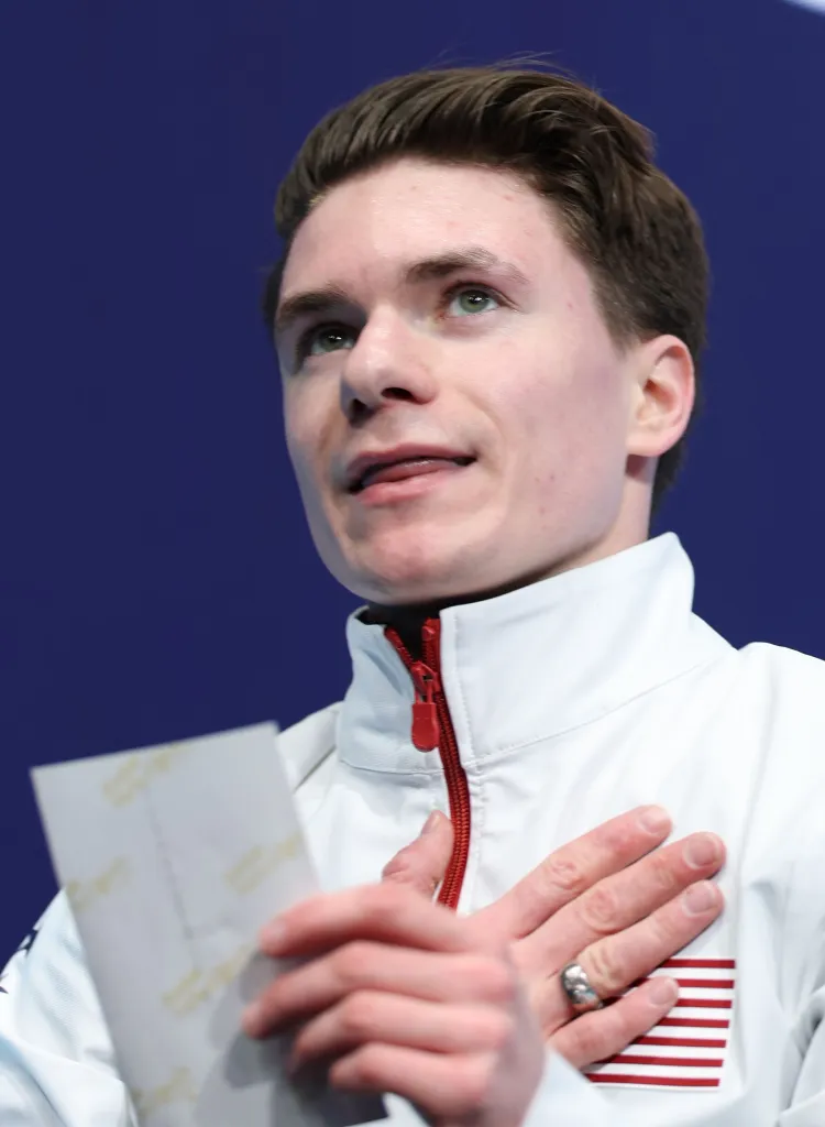 Maxim Naumov of the United States waiting for his score after free skating at the Milan-Cortina 2026 Olympic Winter Games.