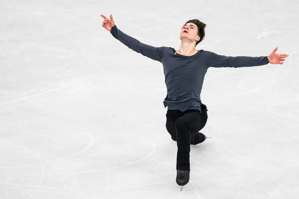 Maxim Naumov of USA competing in men's single figure skating at the 2026 Winter Olympics.