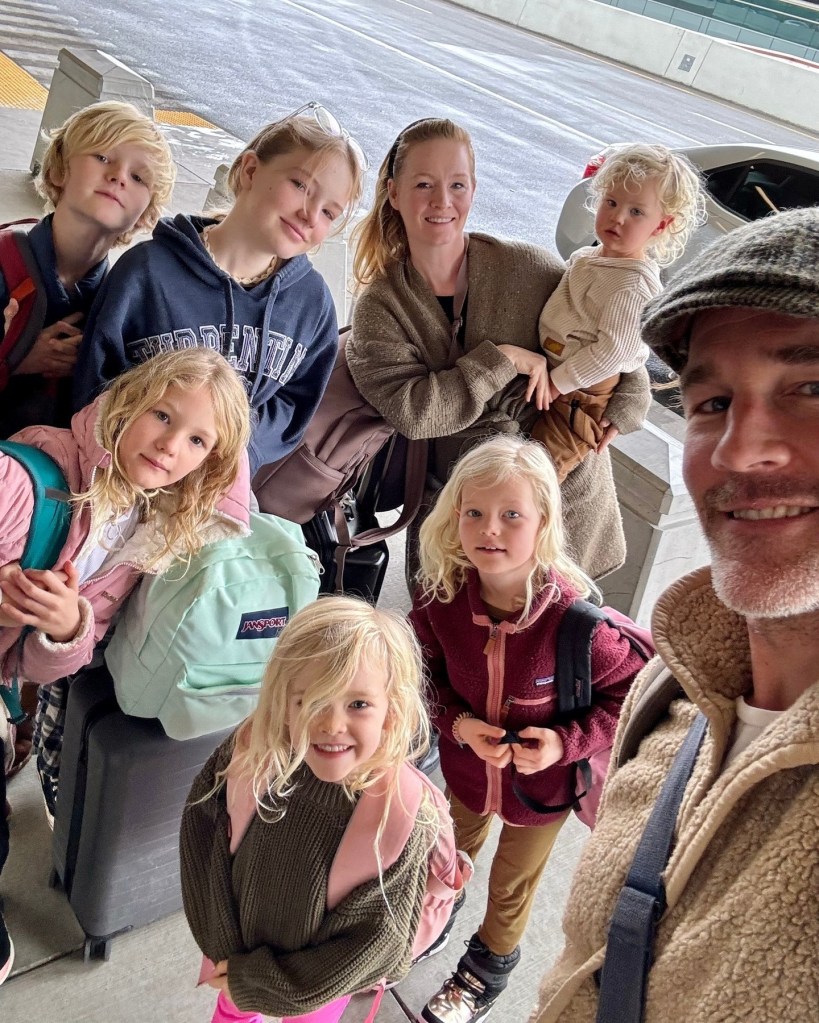 James Van Der Beek, his wife Kimberly, and their six children pose for a family selfie.