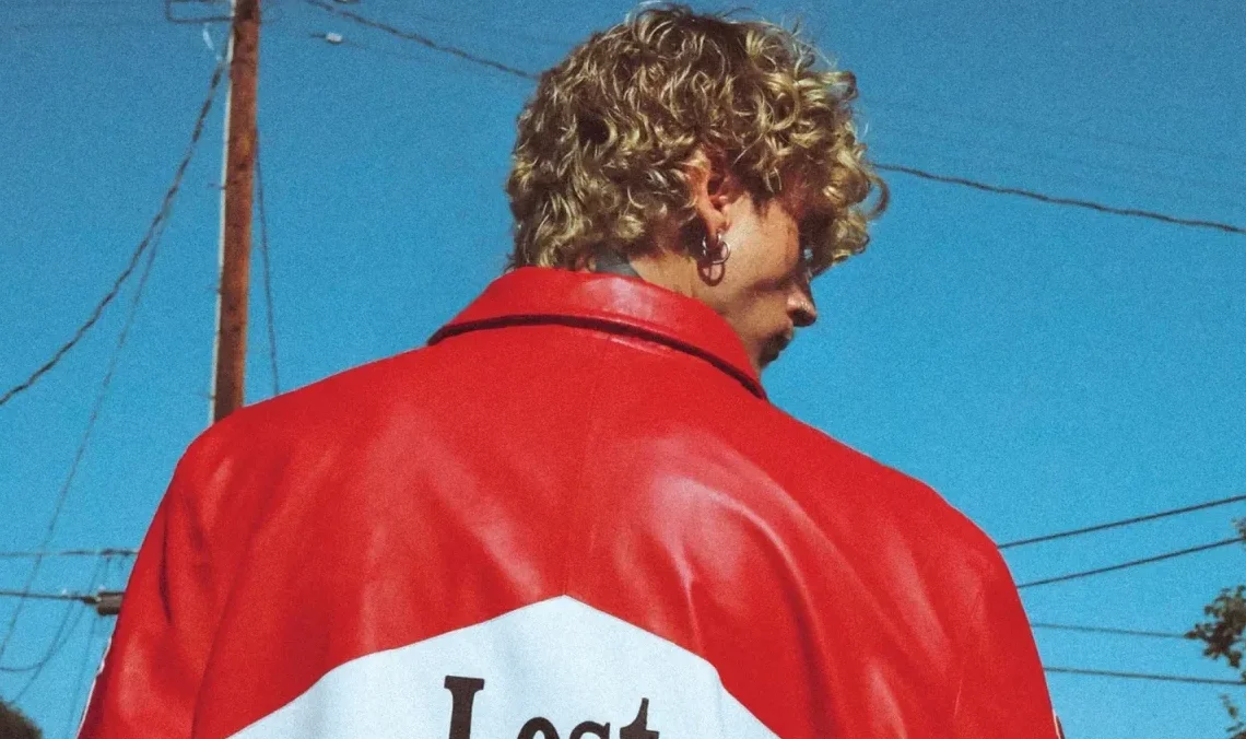 WATCH: Machine Gun Kelly Halts Show After Stage Diving Fan Hilariously Splits Crowd and Lands on the Floor