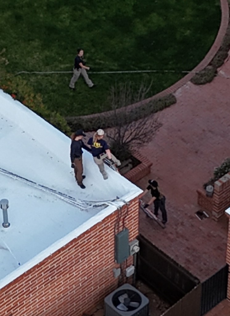 FBI officers searching Nancy Guthrie's home.
