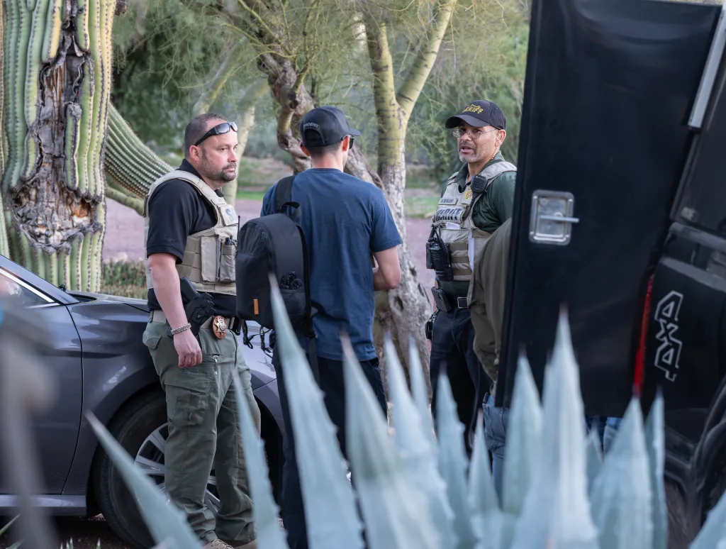 Law enforcement personnel gather at Nancy Guthrie's home in Tucson, Arizona, during an investigation into her disappearance.