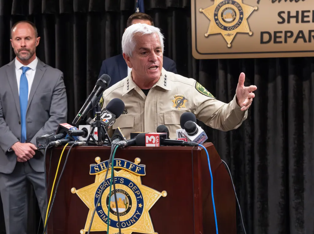 Pima County Sheriff Chris Nanos speaks to the media at a press conference.