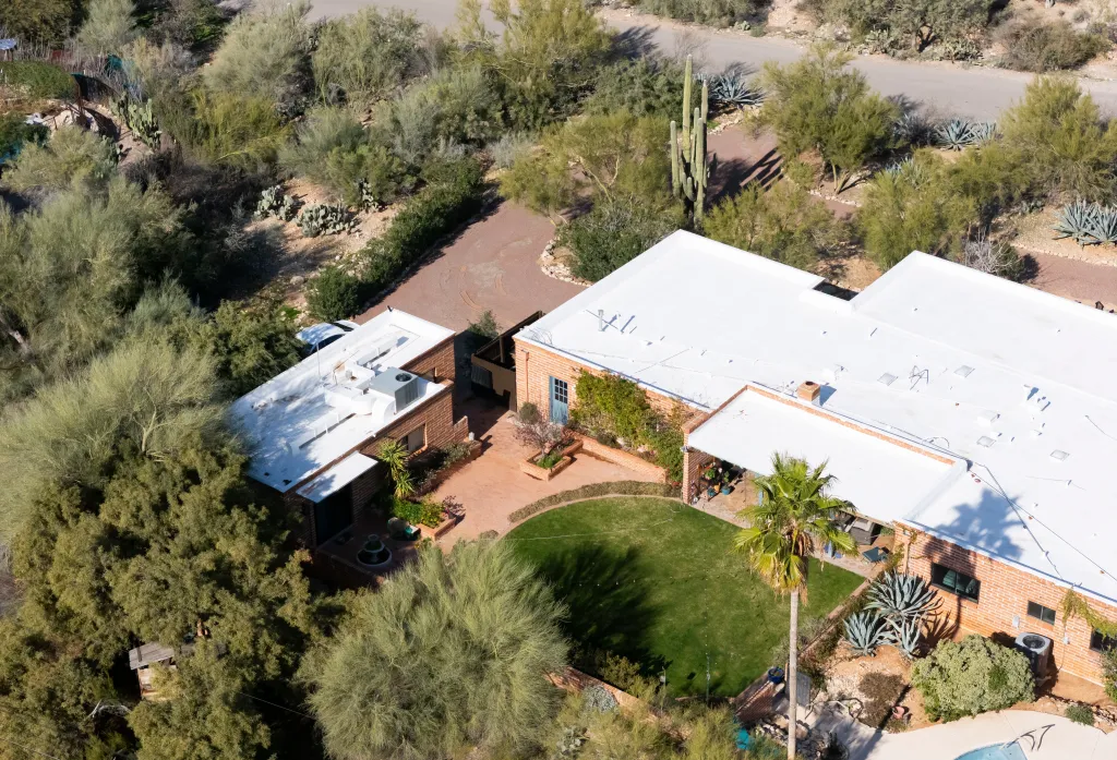 Aerial view of Nancy Guthrie's house in Tucson, Arizona, surrounded by desert vegetation.