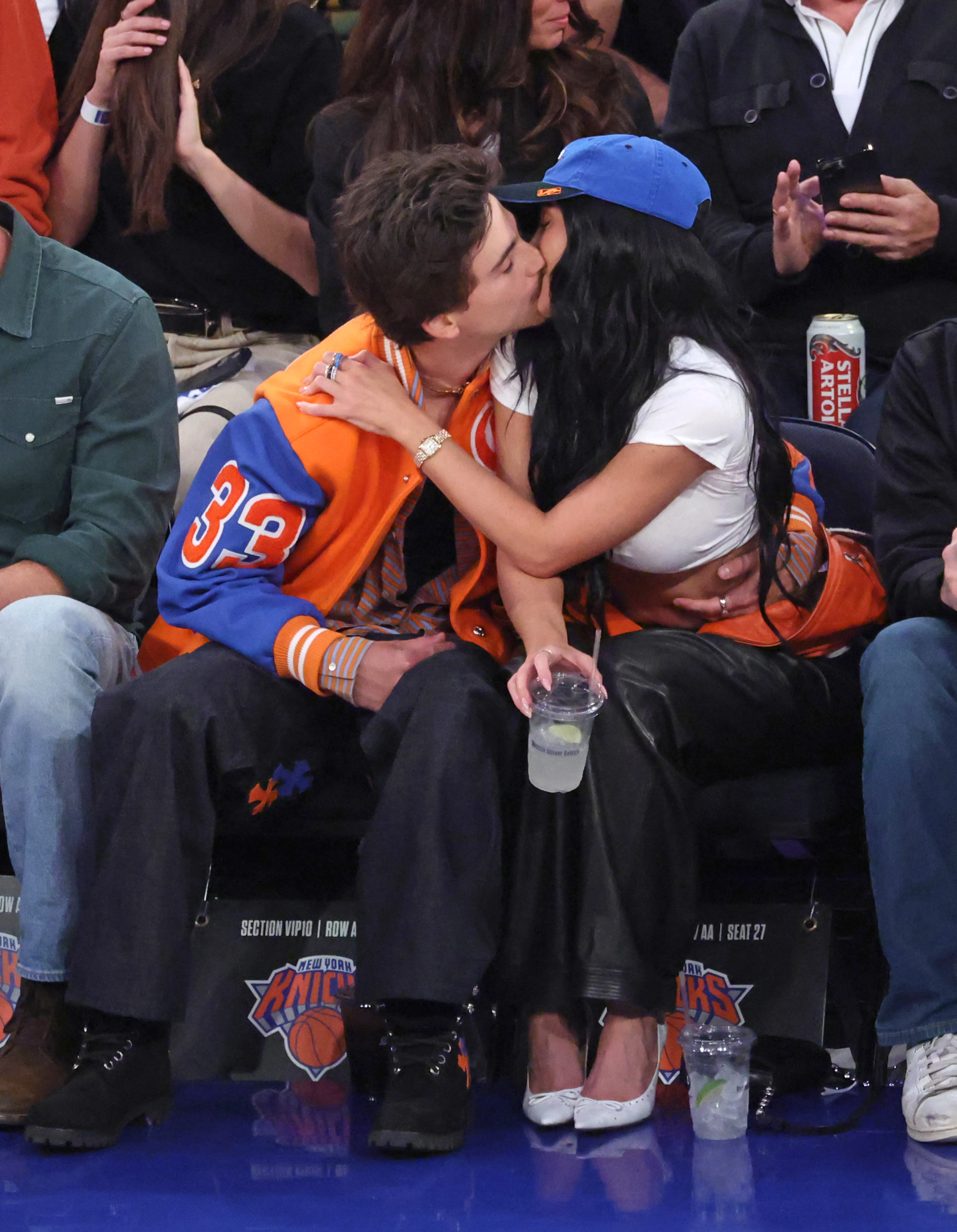 Timothée Chalamet and Kylie Jenner kissing at the NBA Playoffs Eastern Conference Finals.