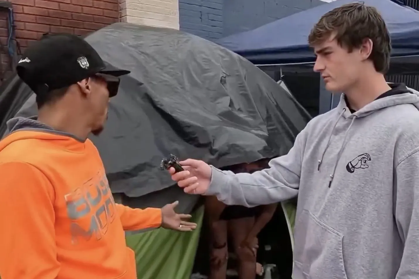 Nick Shirley interviews a migrant in a tent in Skid Row.