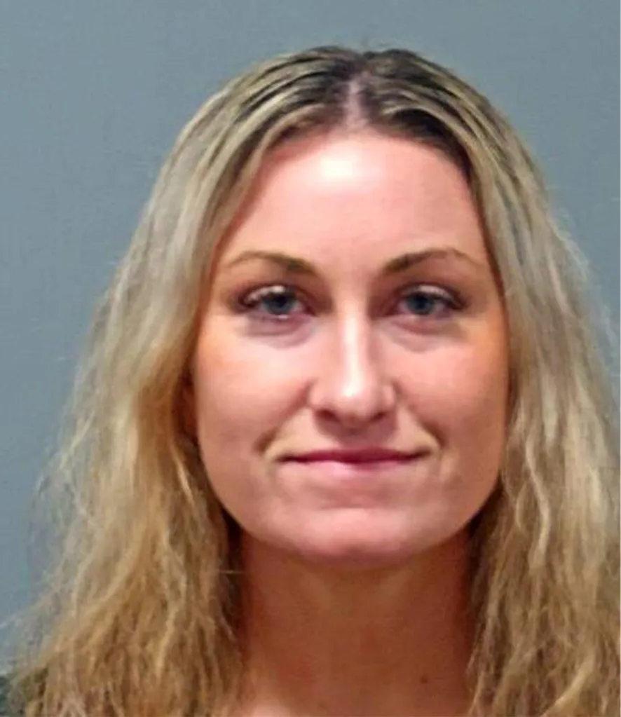Mugshot of Olivia Clendenin, a 29-year-old woman with long blonde hair and blue eyes.