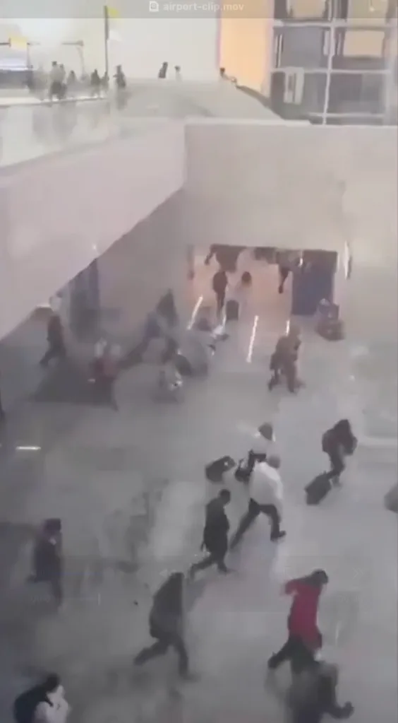 Panicked air travelers ran for their lives at one of Mexico's busiest airports on Sunday as cartel violence erupted at a popular resort region in the Central American nation