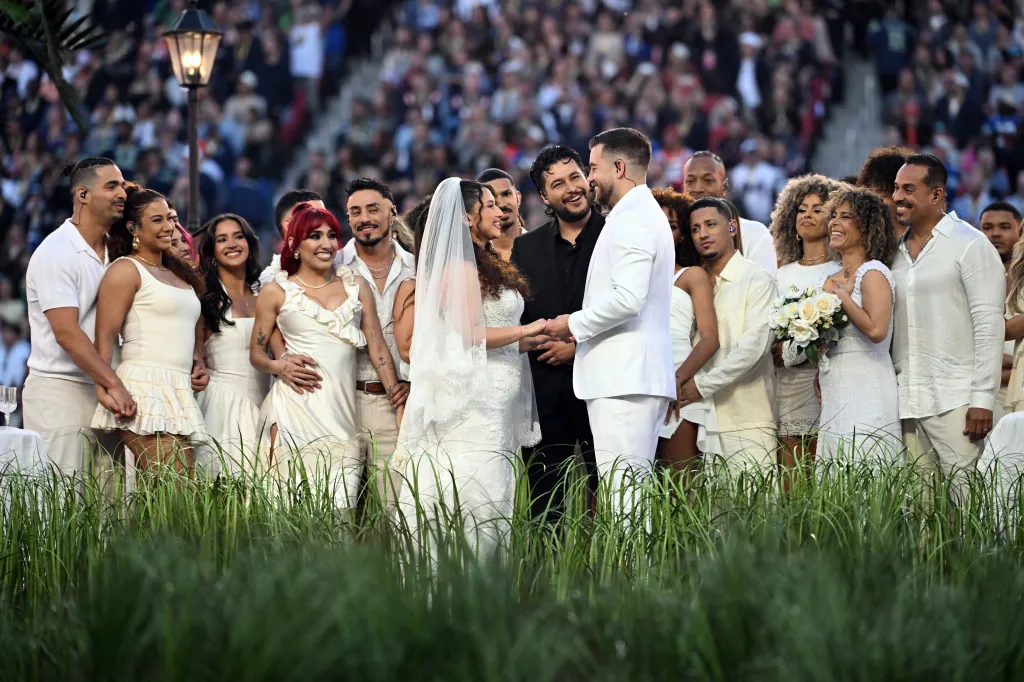 A couple getting married during a halftime show.