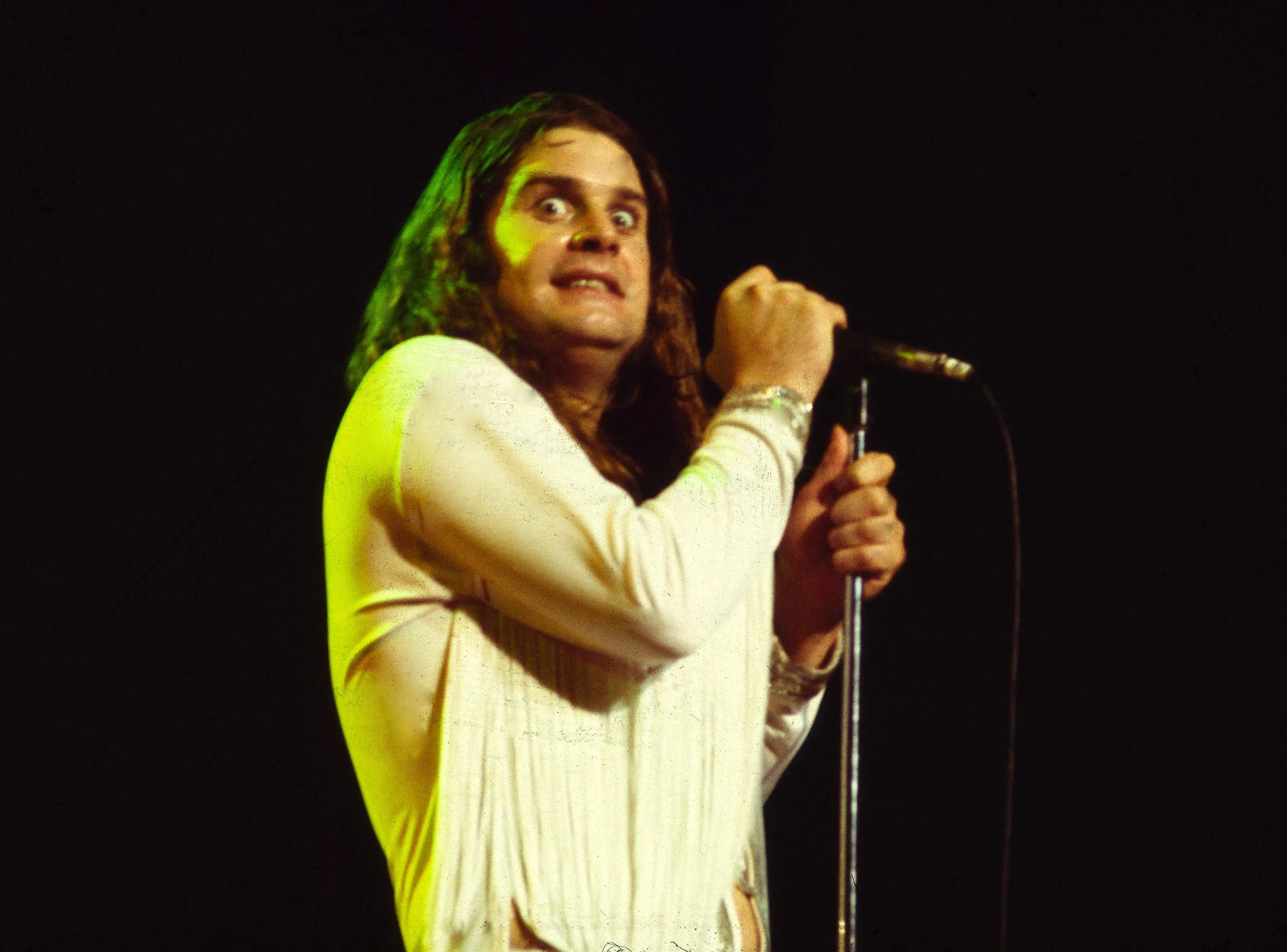 Ozzy Osbourne performing live onstage.