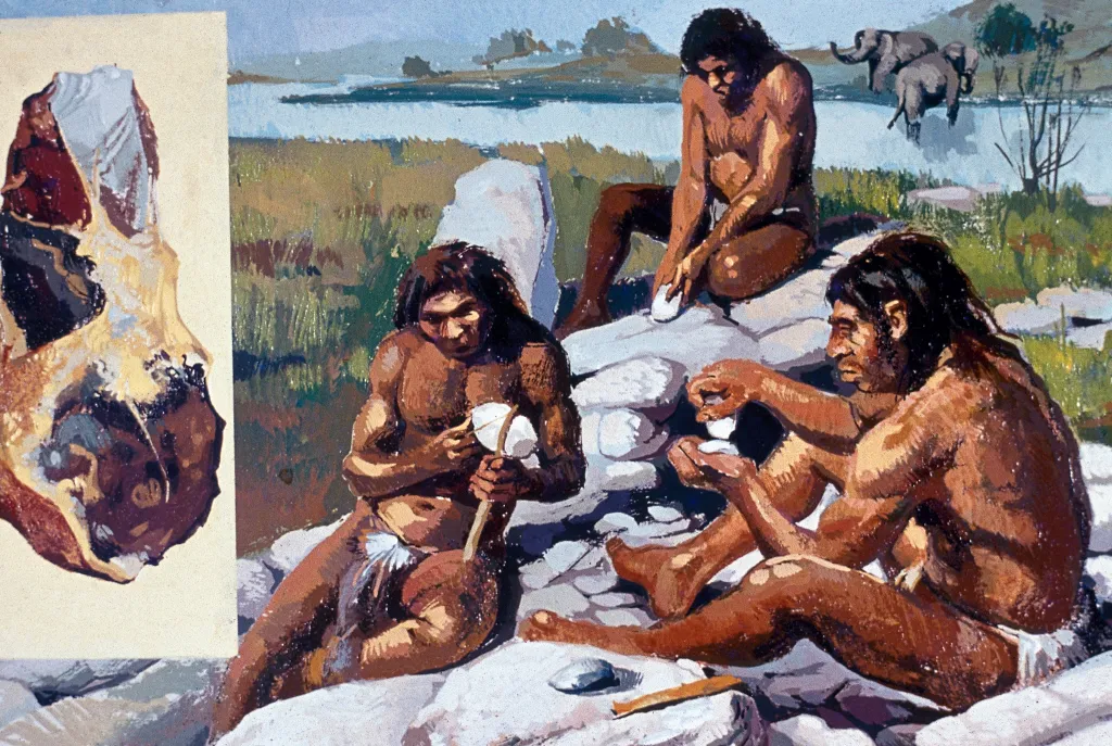 Illustration of three Neanderthals making weapons and tools by a river.