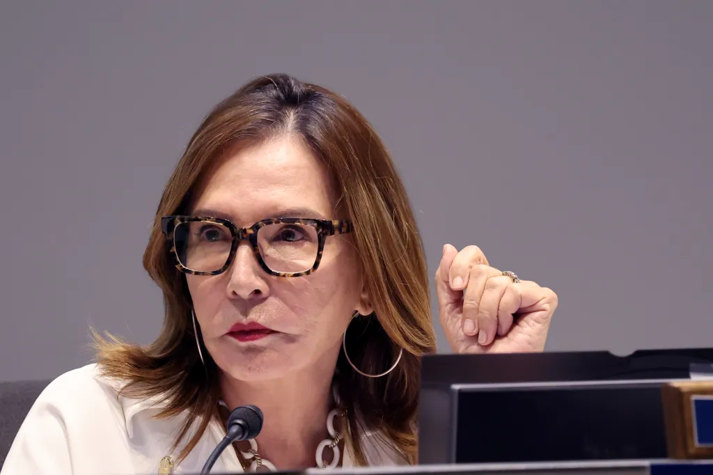 Teresa Sanchez-Gordon, President of the Police Commission, listens at a meeting.