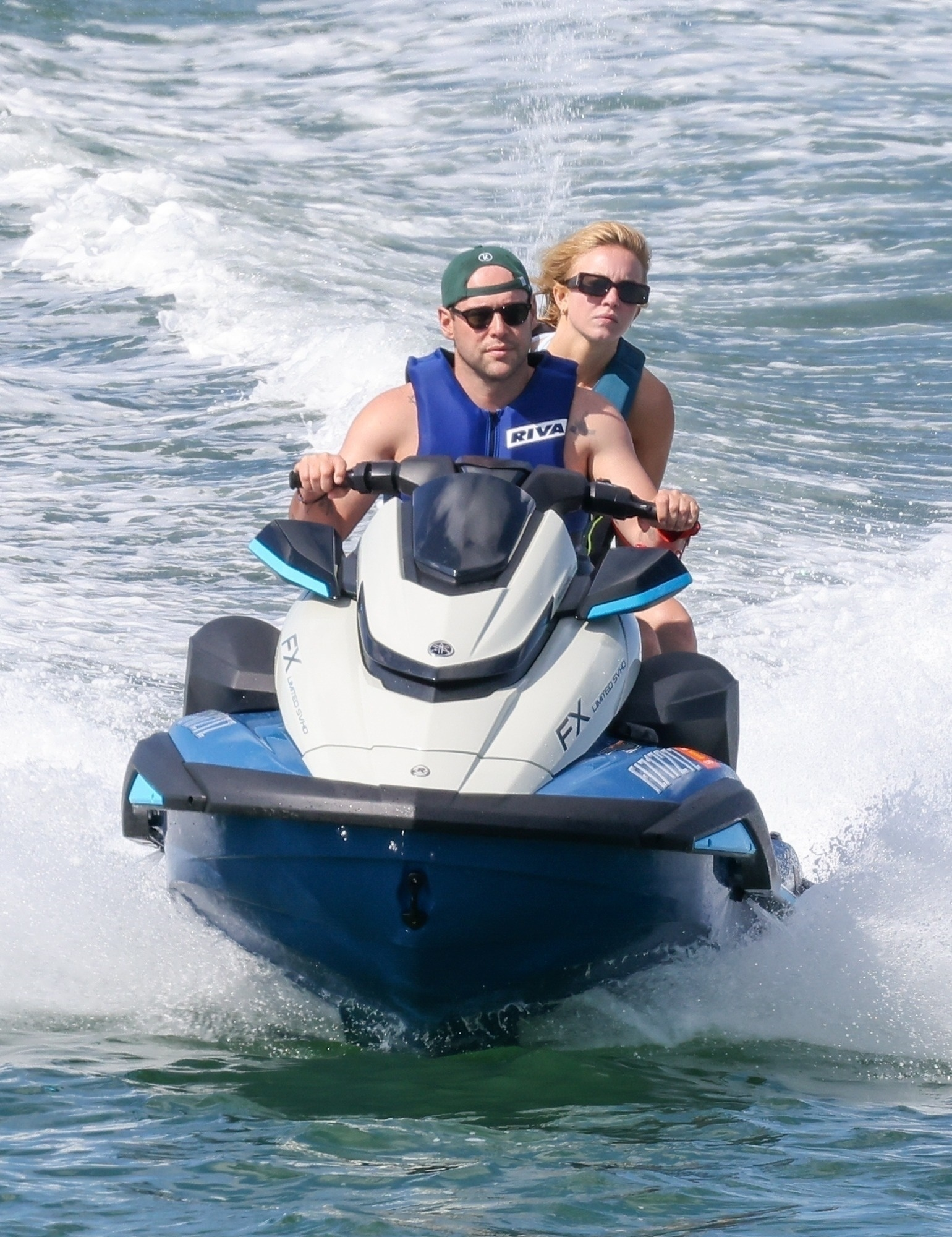 Sydney Sweeney and Scooter Braun on a jet ski in the Florida Keys.