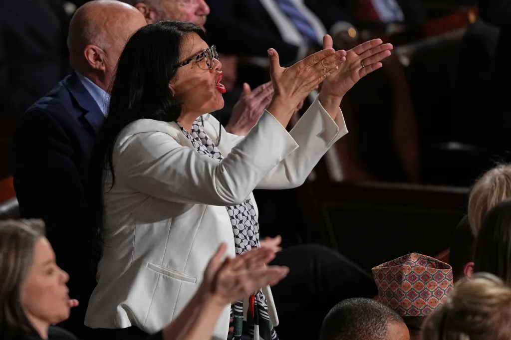 Rep. Rashida Tlaib gestures while President Trump delivers the State of the Union address.