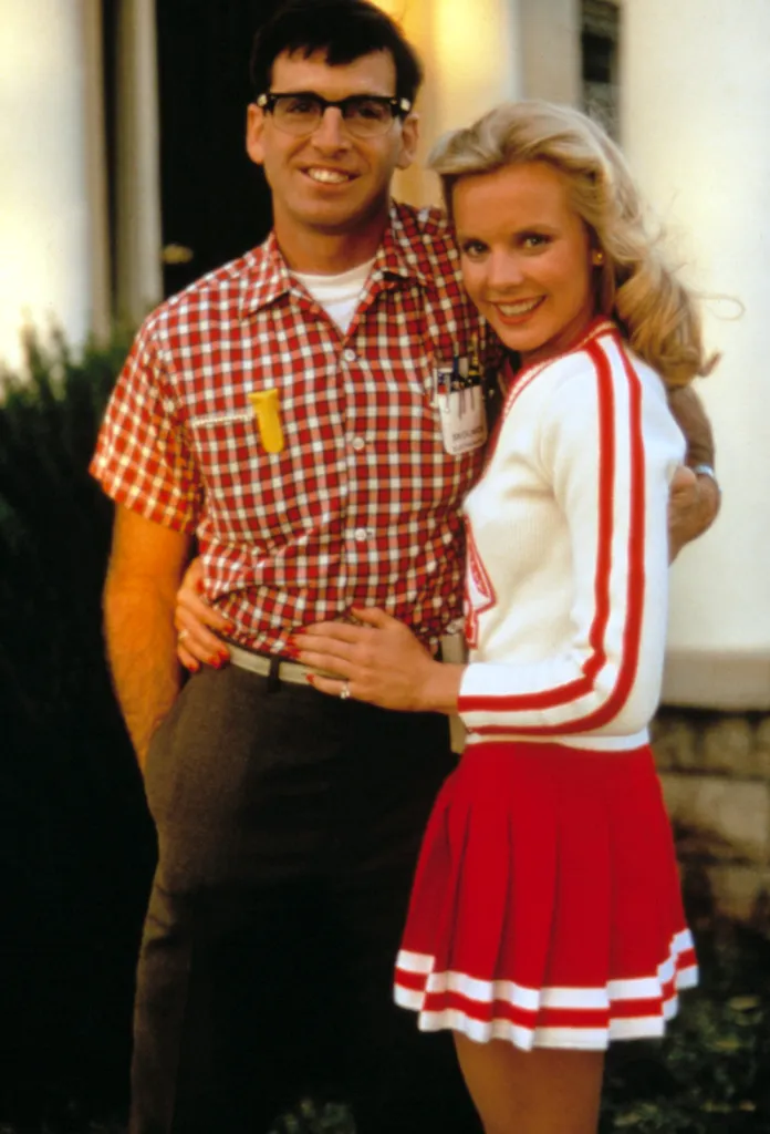 Robert Carradine as Lewis Skolnick and Michelle Meyrink as Judy from the movie Revenge of the Nerds.