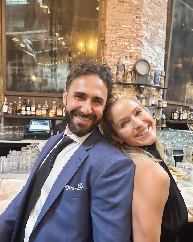 Sara Haines and Max Shifrin smiling at a bar.