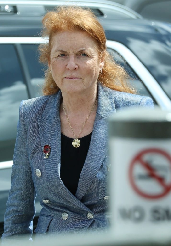 Sarah Ferguson, The Duchess of York, wearing a poppy pin on her blazer at Perth Airport.