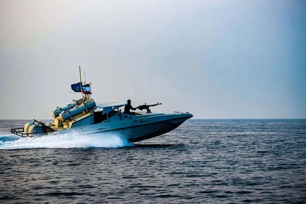 The Islamic Revolutionary Guard Corps (IRGC) jet boat takes part in a military drill in the waters off southern Iran coast on December 5, 2025.