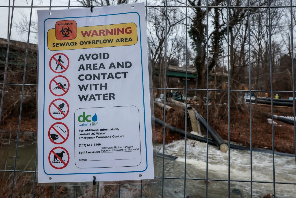 A warning sign is posted alerting of dangerous water on Cabin John, Maryland.