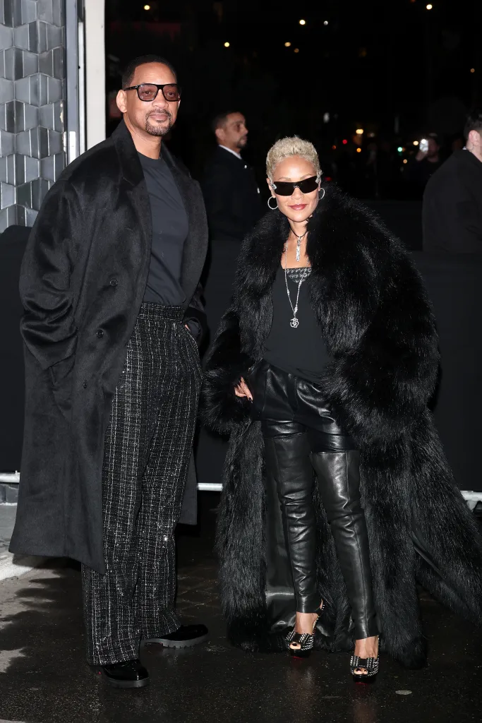 Will Smith and Jada Pinkett Smith posing at the Louboutin Capsule Collection By Jaden Smith Launch at Paris Fashion Week.